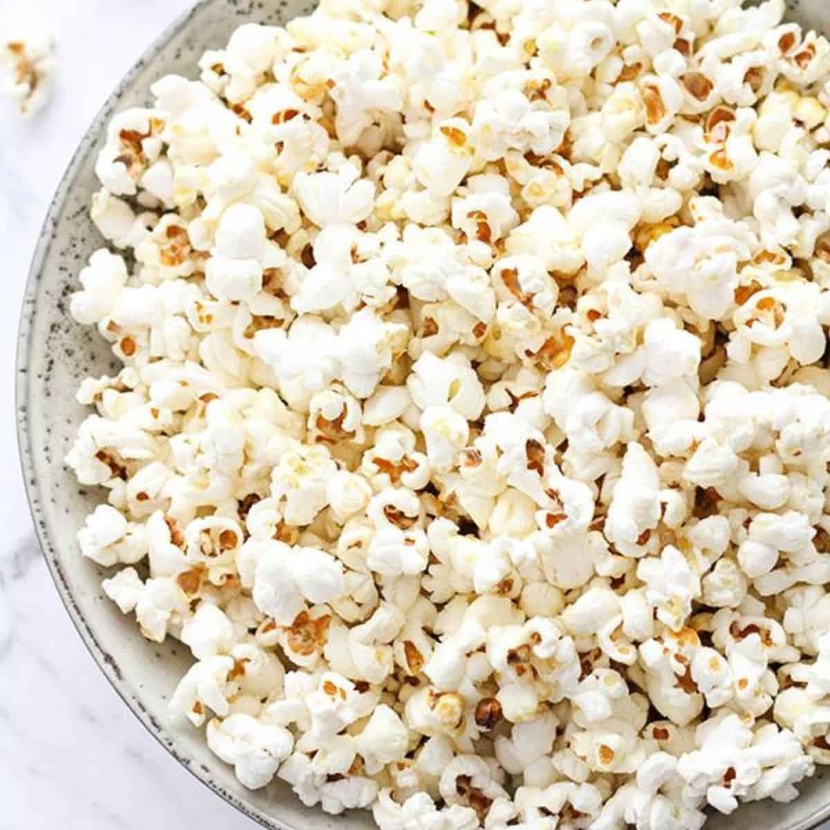 popcorn in a grey bowl.