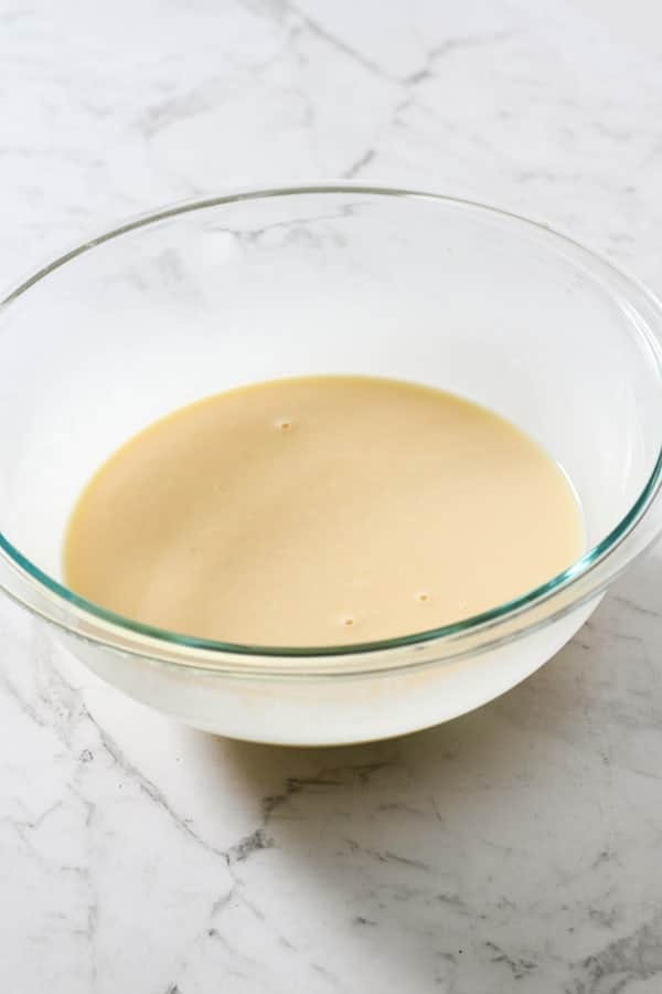 beaten eggs in a glass bowl.