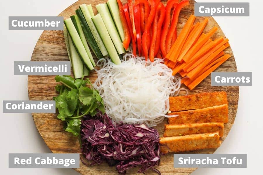 ingredients on a wooden serving board.