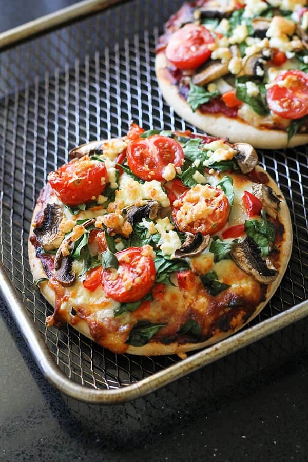 pizzas on a wire rack.