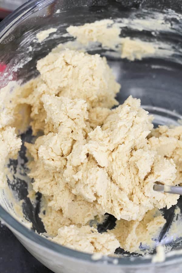 dough in a glass bowl.