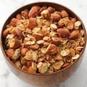 air fryer granola in a wooden bowl.