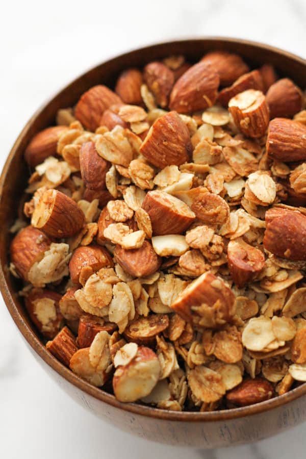 air fryer granola in a wooden bowl.