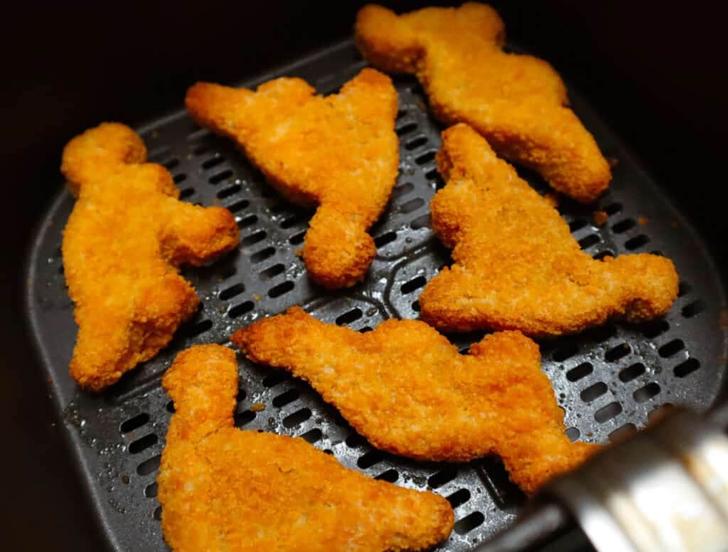 Dino nuggets in Air fryer basket