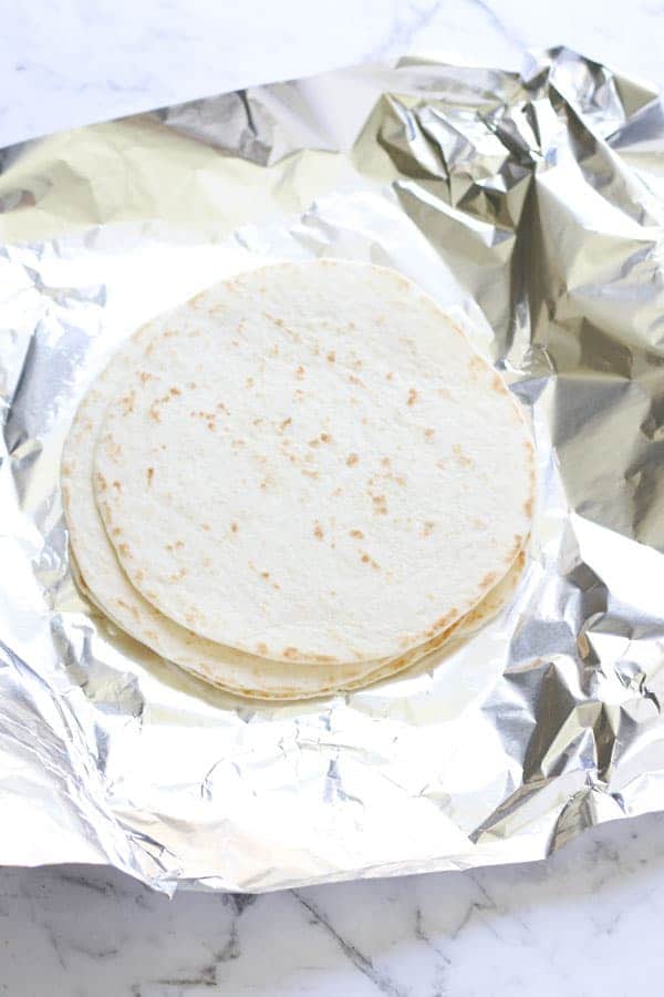 mini flour tortillas on top of alfoil