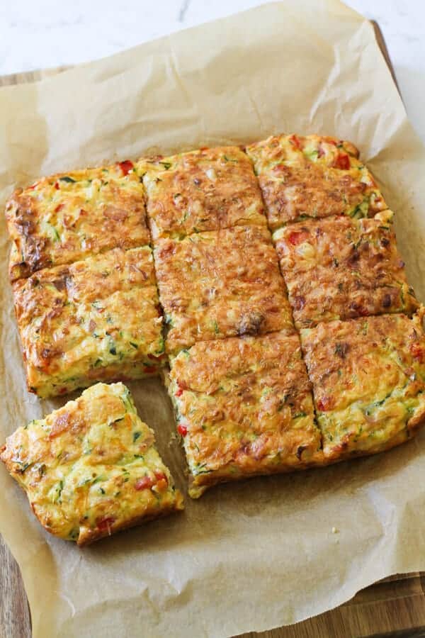 Zucchini and Bacon Slice on top of baking paper.