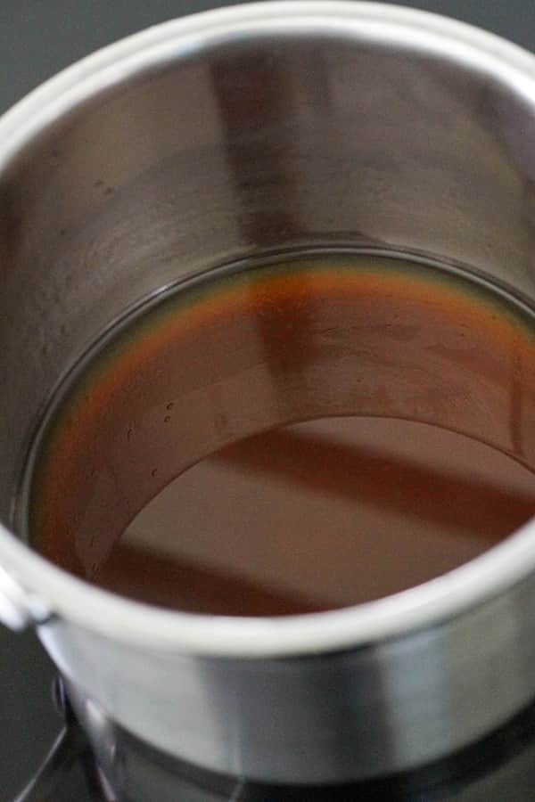 salad dressing in a saucepan.