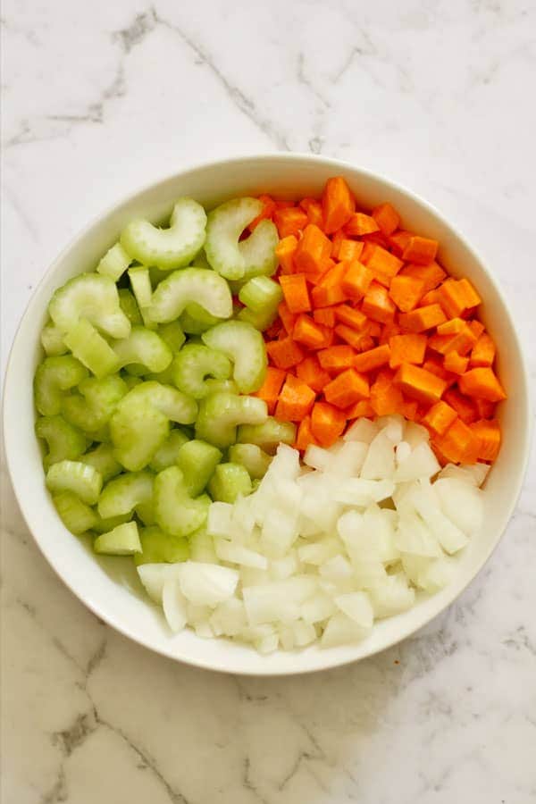 chopped carrot, celery and onion in a bowl