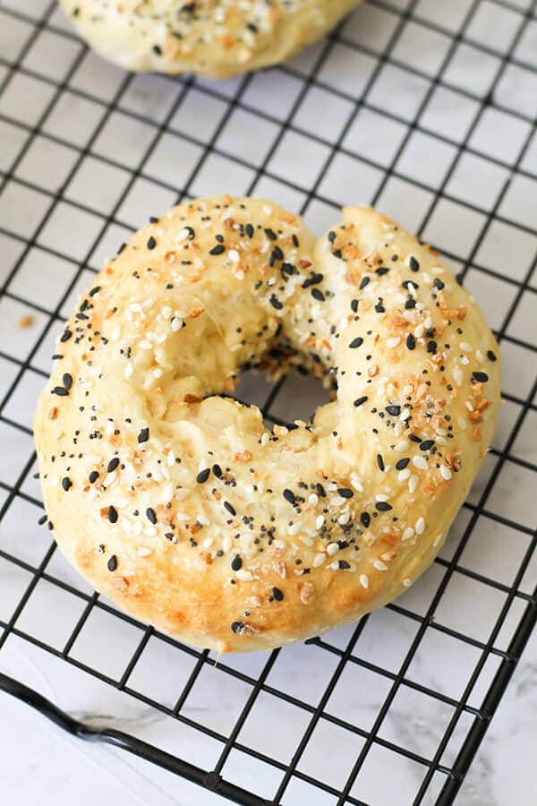 2 Ingredient Bagels on a wire cooling rack.