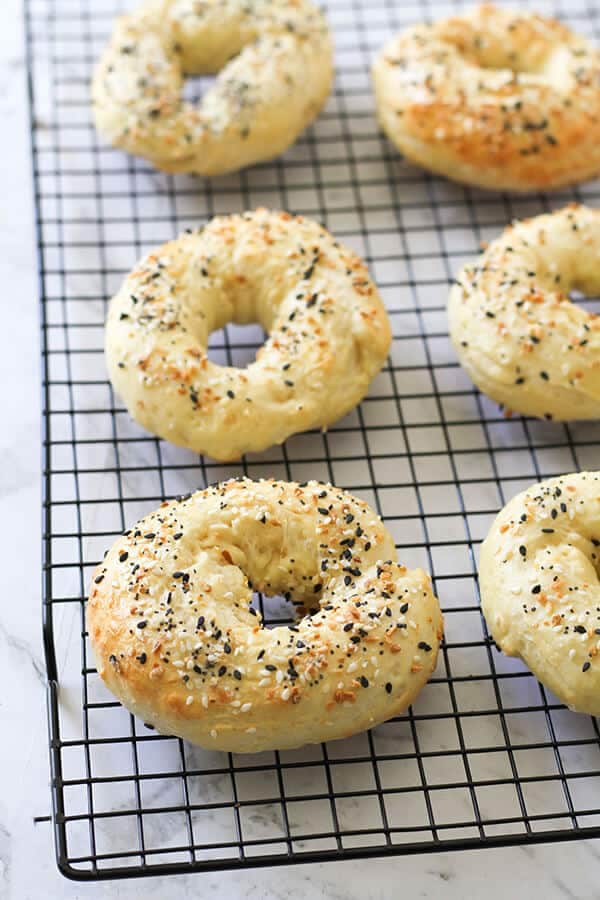 2 Ingredient Bagels on a wire cooling rack.