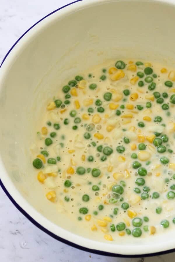 Step by step photo instructions on how to make pea & sweet corn fritters.