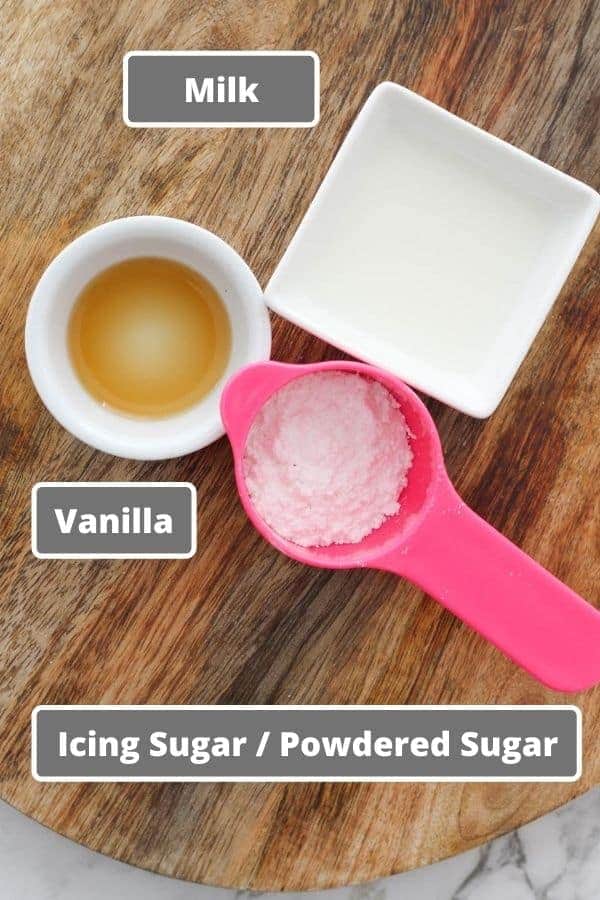 icing ingredients on a wooden board.