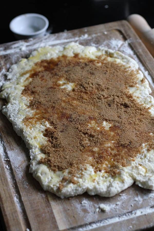 two ingredient dough covered with butter and brown sugar.