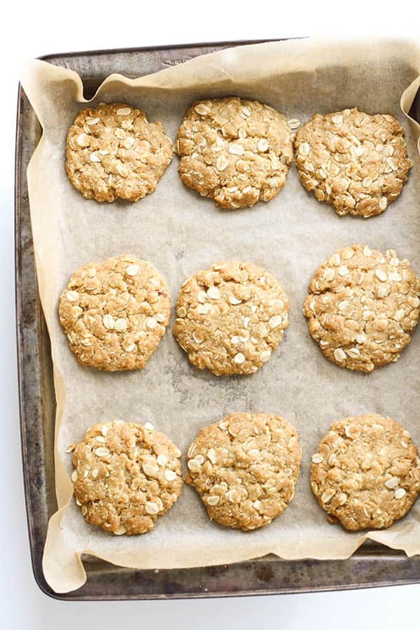anzac biscuits on a baking tray.