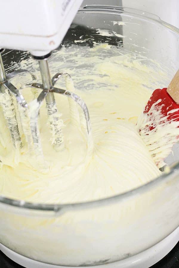 cream cheese frosting in a glass bowl.