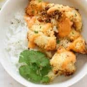 bang bang cauliflower on top of a bed of rice.