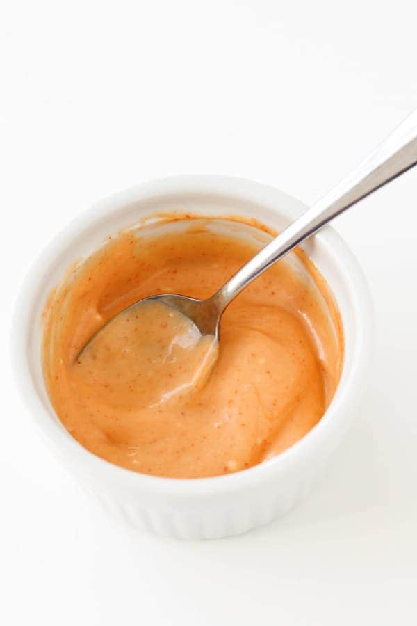 bang bang sauce in a white bowl.