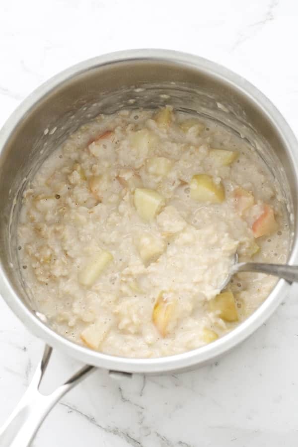 apple cinnamon oats in a saucepan.