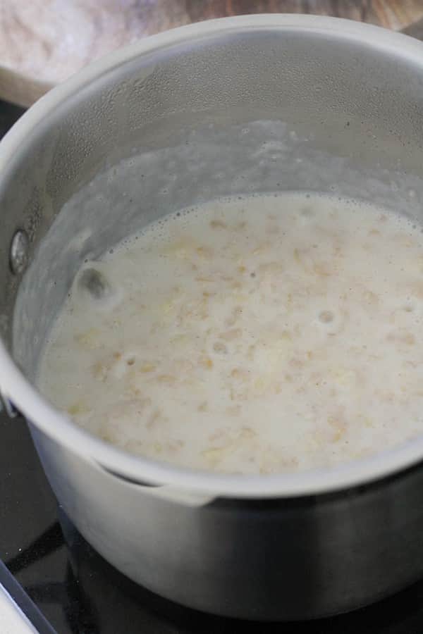saucepan filled with milk and oats.