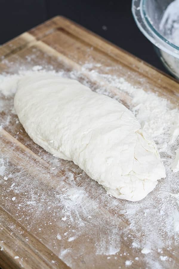 two ingredient dough on a wooden cutting board.