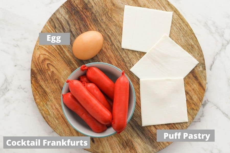 recipe ingredients oon top of a wooden serving board.