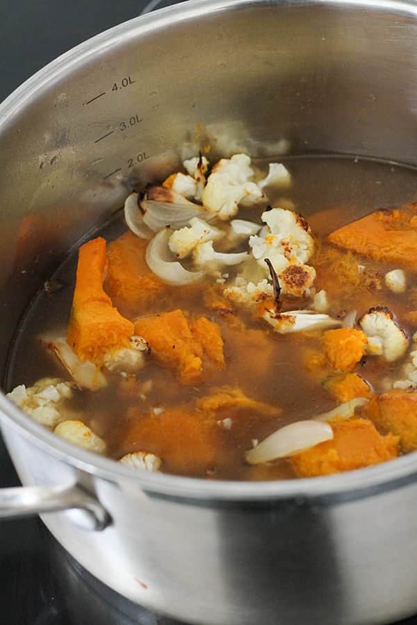 pumpkin, cauliflower and vegetable stock in a large pot.