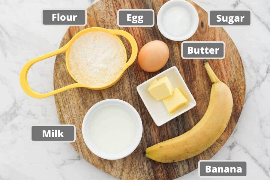 ingredients on top of a wooden board. 