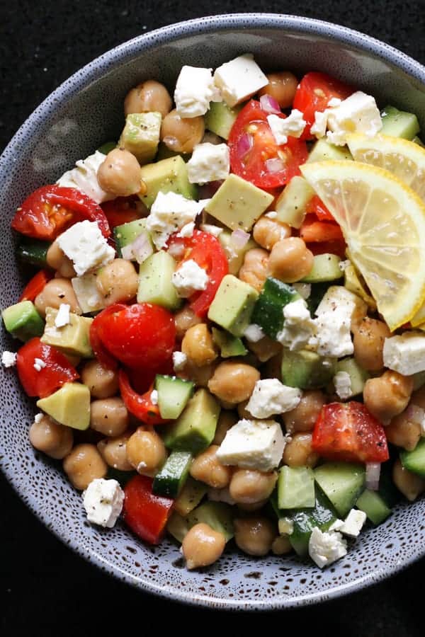 chickpea salad in a blue bowl.