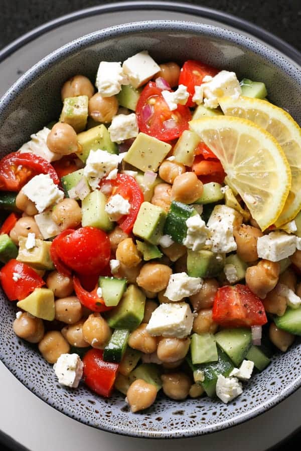 chickpea salad in a blue bowl.