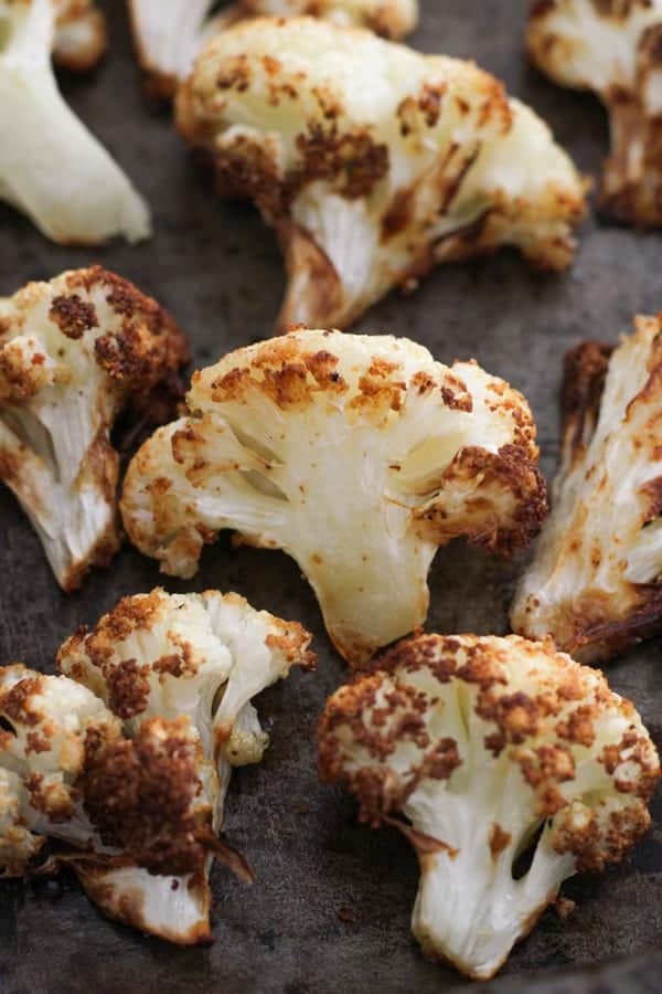roasted cauliflower on a baking tray.