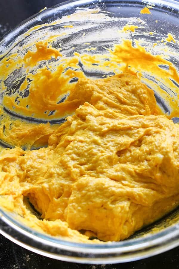 mashed pumpkin in a glass bowl.