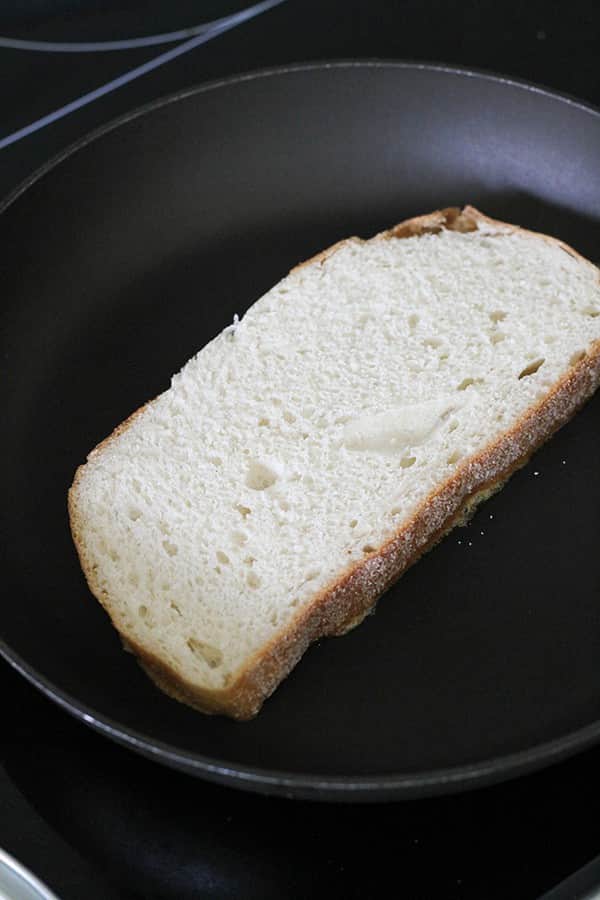 slice of bread in a skillet.