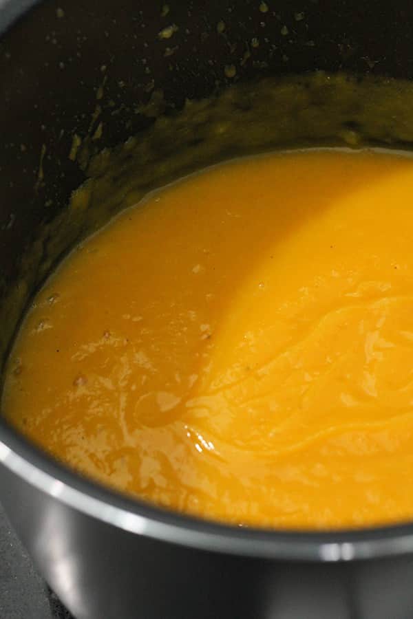 pumpkin soup in a pot.