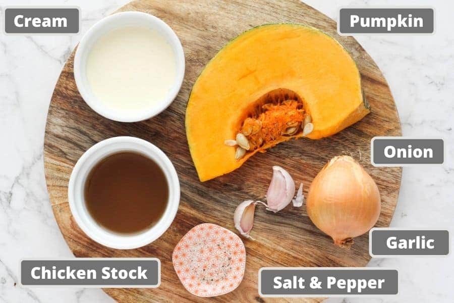 pumpkin soup ingredients including chicken stock, onion and garlic.