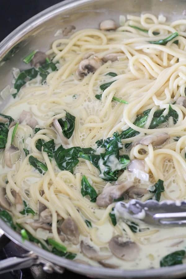 pasta ingredients in a frying pan.