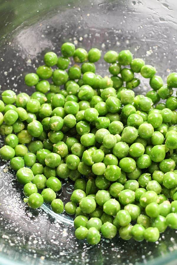 green peas in a glass bowl.