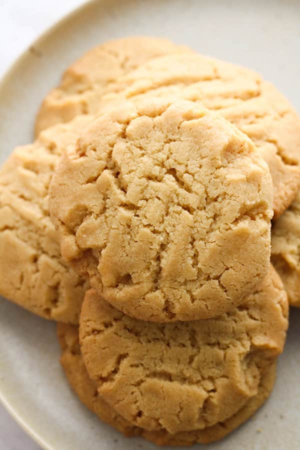 golden syrup cookies in a stack.