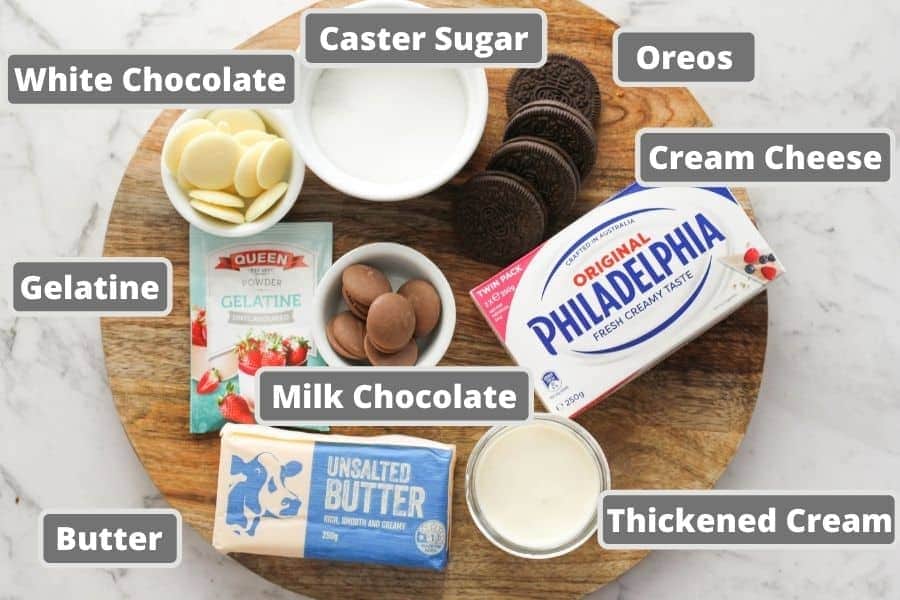 cheesecake ingredients including cream cheese, butter and chocolate.