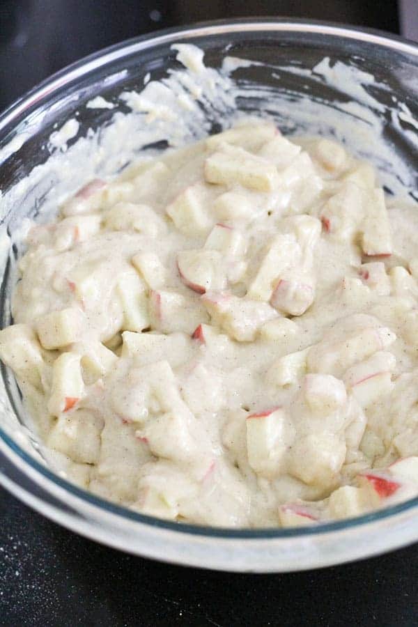 apple crumble muffin mixture in a glass bowl.