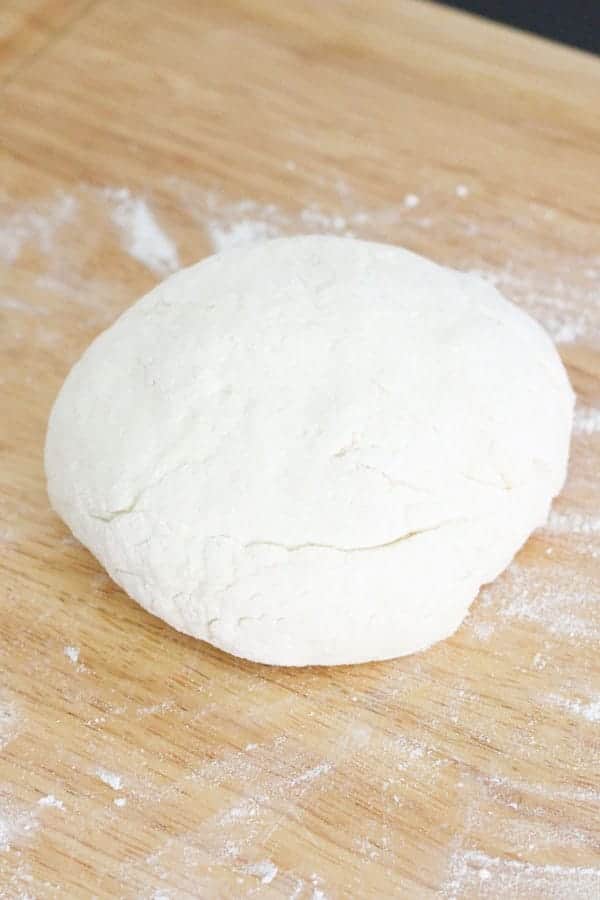 two ingredient dough on a wooden board.