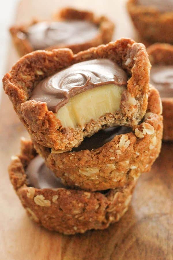 mini caramel tarts stacked on top of each other.