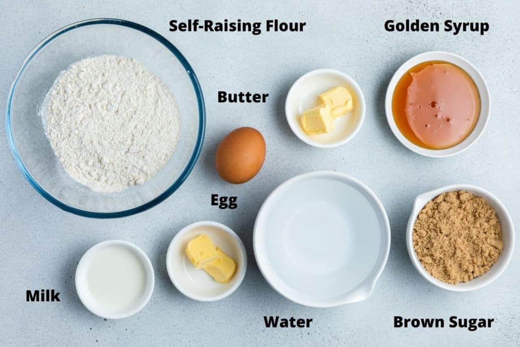 ingredients for golden syrup dumplings on a white background.