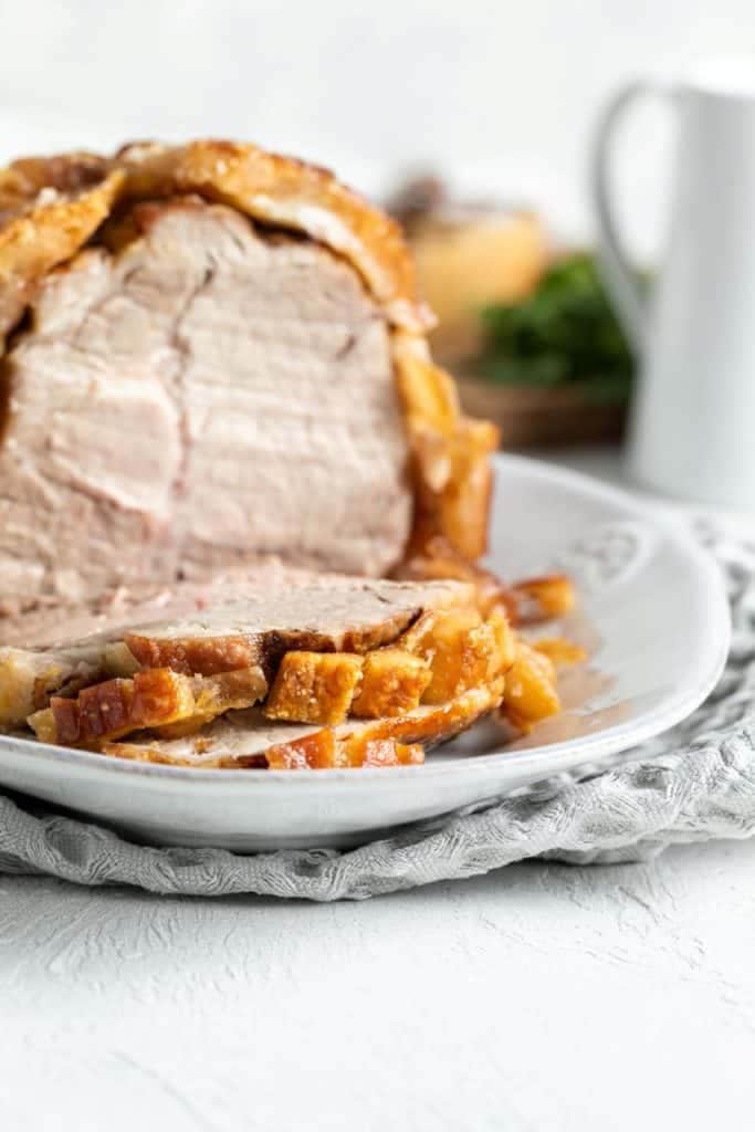 close up image of a few slices of roast pork.
