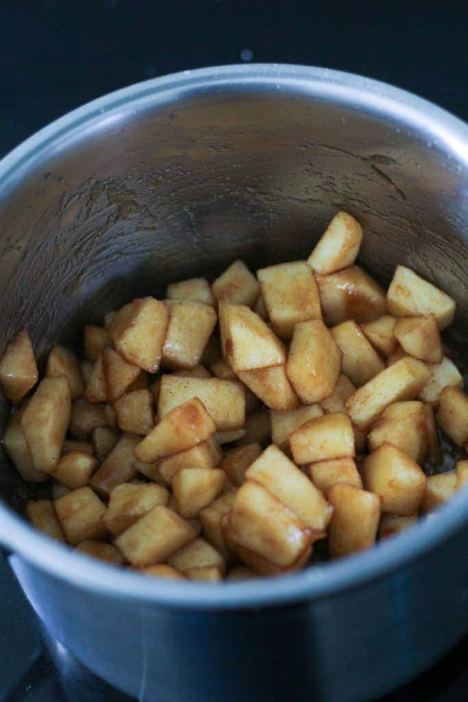diced apples in a saucepan.