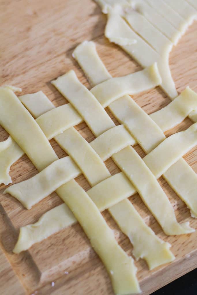 shortcrust pastry cut out in a lattice pattern.