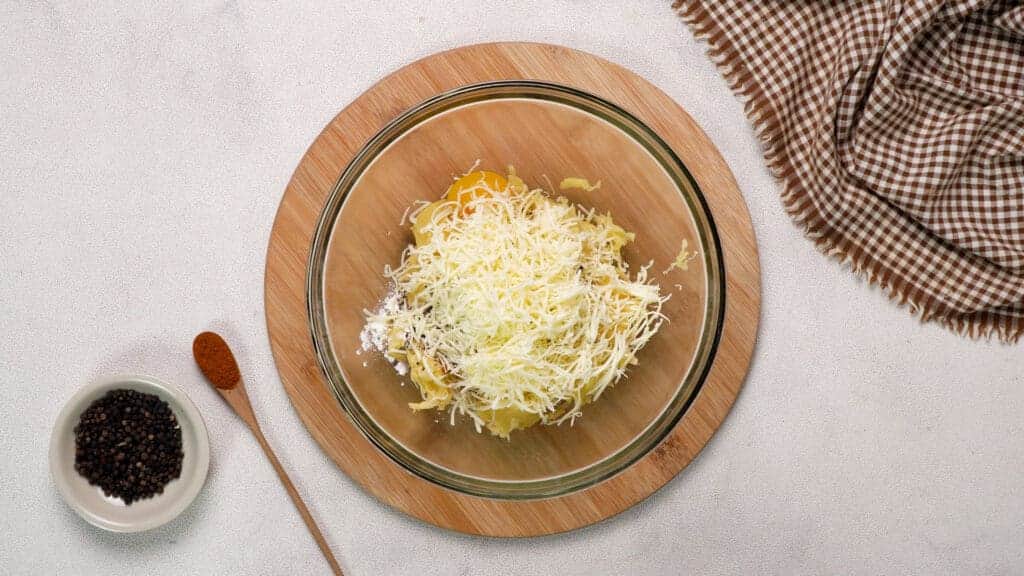 Ingredients and potatoes in the bowl