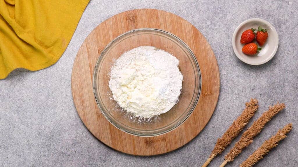 A large bowl contains ingredients