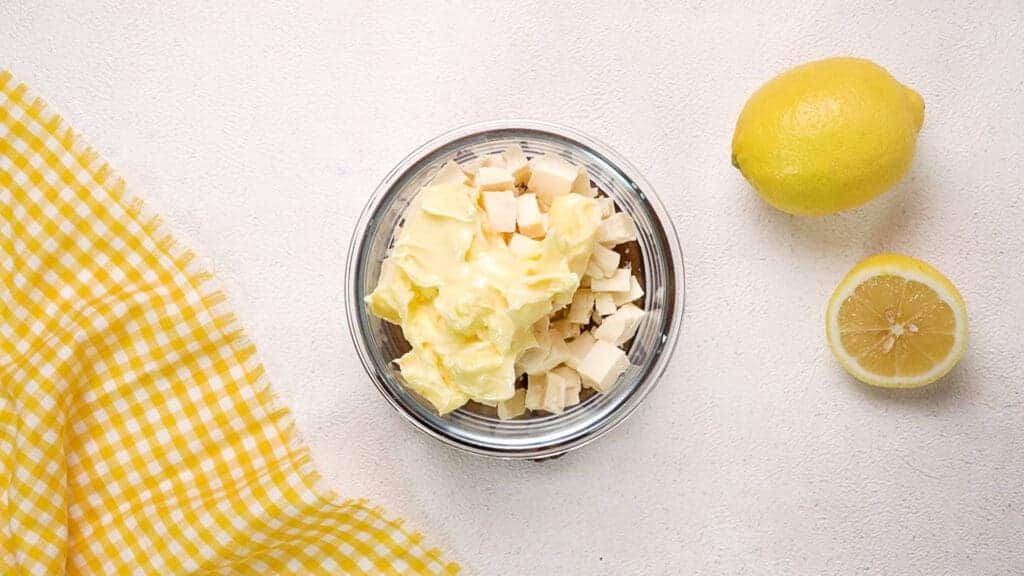 Butter and white chocolate in small bowl