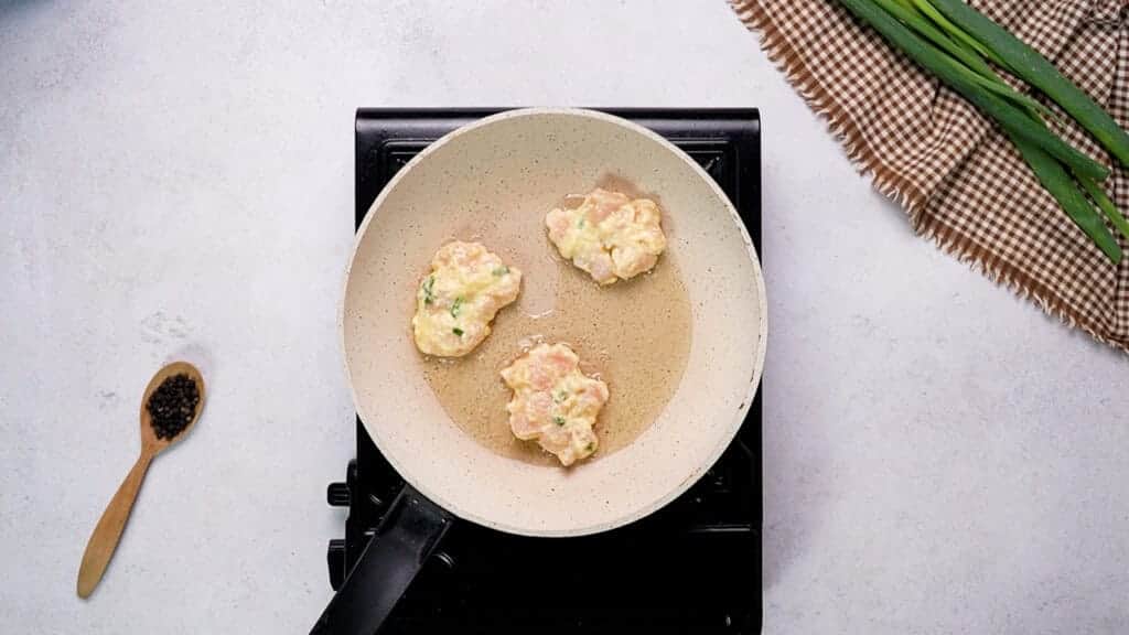 Mixture on hot pan with olive oil