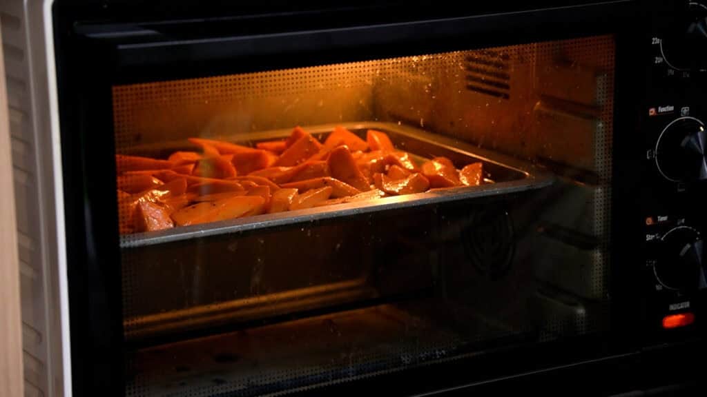 Put the tray to the oven